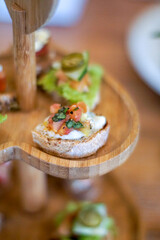 Assorted Bruschetta's on wooden tray