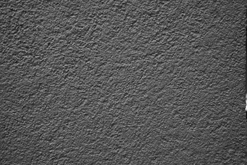 Texture of a rough concrete wall surface.