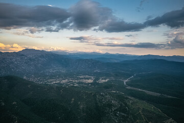 Large, impressive mountains covered with trees in the Akseki district of Antalya. Cloudy skies and unique natural scenery. Antalya, Turkey.