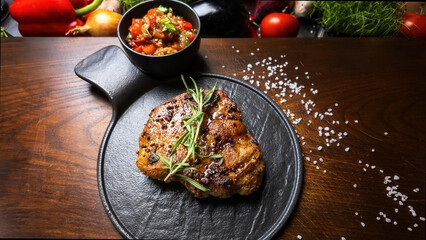 Grilled meat steak on wooden board