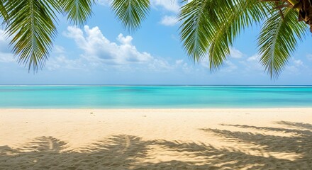 Obraz premium Stunning tropical beach featuring turquoise water, white sand, and palm tree fronds in the sky.