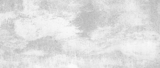 A white  abstract texture background with a grey cloud in the sky. The wall is covered in white paint. The cloud is white and has a greyish tint