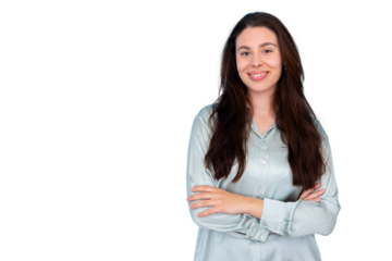 Portrait of a young businesswoman smiling with crossed arms, showing confidence, on a transparent background