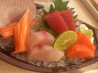 Mixed sashimi with crab sticks, seaweed, tuna, salmon fish fresh, cold 