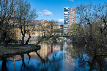 Motala Stream and the industrial landscape at Gamlebro during early spring 2025 in Norrköping. Norrköping is a historic industrial town in Sweden.