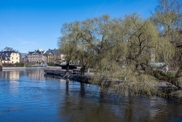 Motala Stream and Strömsholmen islet during early spring in Norrköping. Norrköping is a historic industrial town in Sweden.
