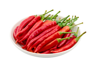 closeup pile of red chili pepper cayenne in ceramic white bowl cutout