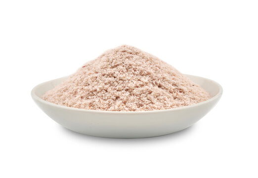 closeup pile of psyllium husk in ceramic white bowl cutout