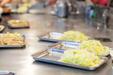 Cabbage teppanyaki is a comforting and flavorful dish that highlights the natural sweetness and crunch of fresh cabbage. Cooked on a sizzling iron plate, the leaves are charred just enough to release