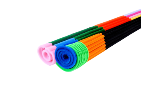 Colorful Rolled Craft Materials On Black Background An Isolated Photo