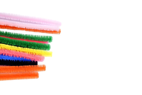 Colorful Pipe Cleaners Stacked Isolated on Black Background Illustration