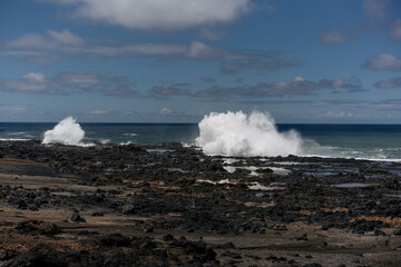 waves crashing on rocks