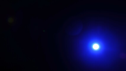 Bright Blue Light Glow Against Dark Background