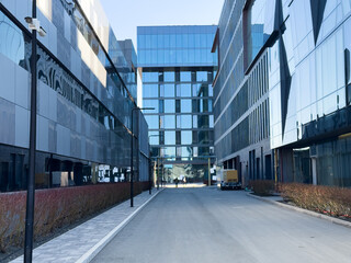 Obraz premium Looking Up Blue Modern Office Building