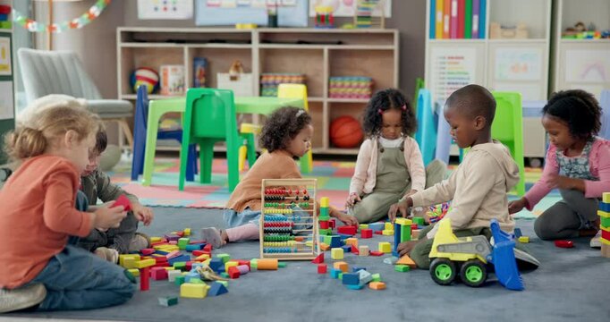 Kids, students and play with blocks in classroom of learning, problem solving and creative activity. Children, toys and floor for education game, puzzle solution and motor development in kindergarten - Powered by Adobe