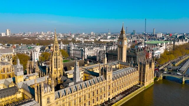 Aerial view of the Palace of Westminster in London, England, UK, on a clear day. Iconic UK landmark ideal for travel, tourism, architecture, and cultural-themed commercial use