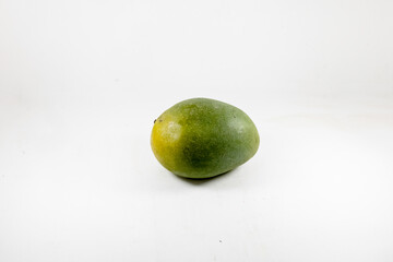 Fresh green mango isolated on white background. Perfect for concepts of healthy eating, exotic fruits, and minimalistic design.