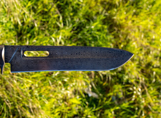 Damascus knives are known for their wavy steel patterns, strength, and sharpness. Made by folding multiple steels, they combine durability with unique, artistic beauty.