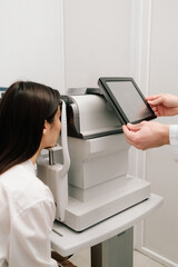 Autorefractor measures refractive errors, helping determine prescriptions for glasses or contact...