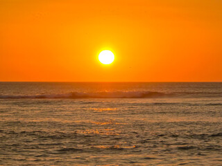 Sunset in a bay with lots of sea on a vacation trip