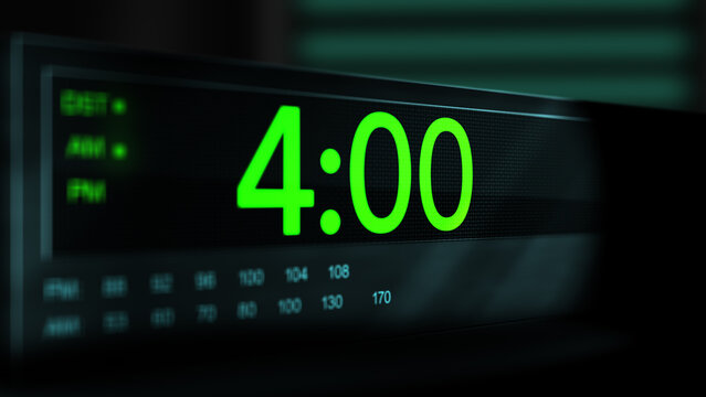 Camera pans across old digital clock as time arrives at 4 AM - Green Version