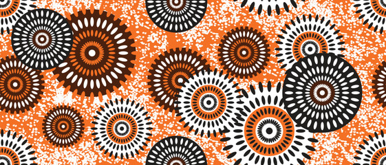 African ethnic traditional yellow, tangerine pattern. seamless beautiful Kitenge, chitenge style. fashion design in colorful. Geometric circle abstract motif. Floral Ankara prints, African wax prints. © Choltita