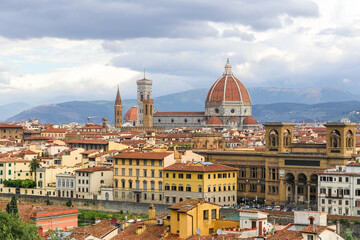 A Florence Firenze city in Italy Toscana view with a river running through it and Cathedral di...