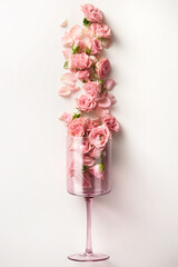 Roses arranged in a glass viewed from above. Top view. Romantic scene