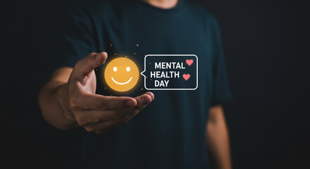 Gently cradling a glowing smiley face, celebrating World Mental Health Day with warmth and hope, against a dark backdrop.