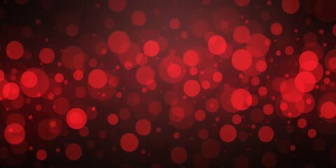 Red bokeh lights floating against a dark background creating a festive and dreamy atmosphere
