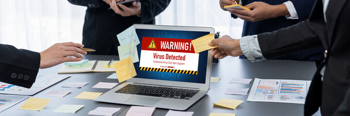 Virus warning alert on computer screen detected brisk cyber threat , hacker, computer virus and...