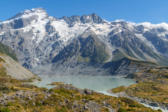 Snow capped mount Sefton with Mueller lake in the foreground. 