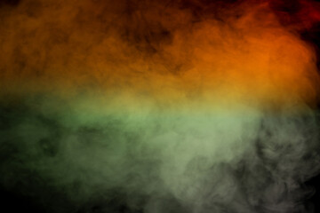 Orange and red steam on a black background.