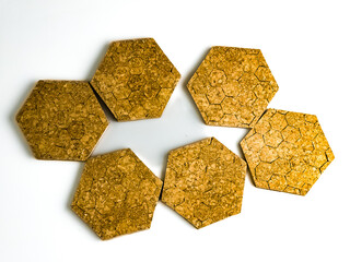 Six cork hot plate trivets in hexagon shape isolated on white background