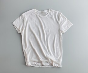 a pristine white t-shirt placed flat on soft gray background