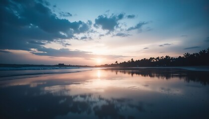 Naklejka premium Serene Sunset Beach: Tranquil ocean reflecting a vibrant sunset, creating a mirror-like image of the sky and palm trees on the shore.