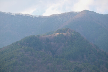 Naklejka premium mountains in the fog