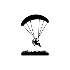Power paraglider hovering over field with visible motor black icon