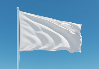 White flag waving in the wind surrender symbol on blue sky background