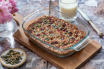 Healthy home baked rolled oats, pumpkin and sunflower seeds breakfast cake