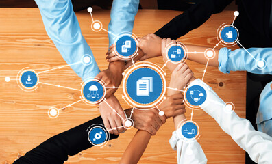 This image captures the essence of teamwork and collaboration in a modern business environment,...