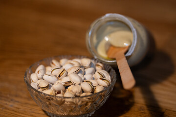 Pistachio cream on a wooden table