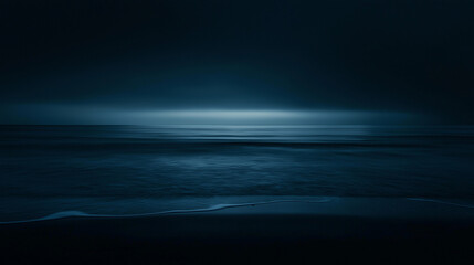 Obraz premium Peaceful dark sky over a calm ocean at night, deep blue and black tones