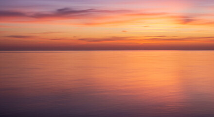 Serene ocean sunset vibrant colors peaceful sky tranquil waters breathtaking view