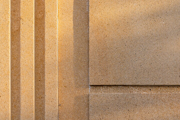 Textured concrete wall surface showcasing a geometric linear pattern