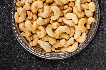 Cashew nuts natural superfood natural food dish organic product fresh tasty gourmet food background on the table rustic food top view copy space keto and paleo diet vegetarian vegan food