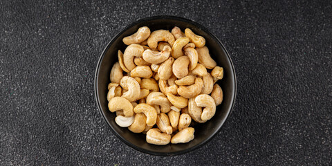 Cashew nuts natural superfood natural food dish organic product fresh tasty gourmet food background on the table rustic food top view copy space keto and paleo diet vegetarian vegan food