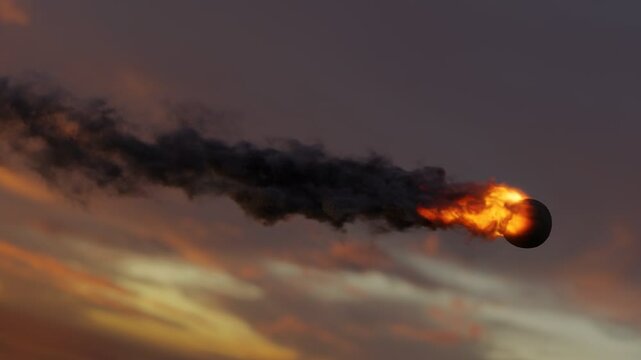 Flying fireball with fire trail in the evening sky