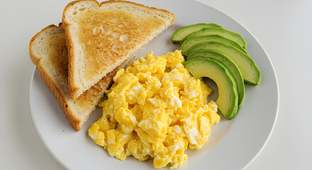 Breakfast Plate With Scrambled Eggs Toast And Avocado Top View