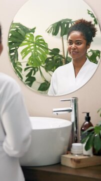 Happy, talking and mirror with woman in bathroom for motivation speech, morning routine and mindset. Inspiration, reflection or self affirmation with person at home for confidence or mental health